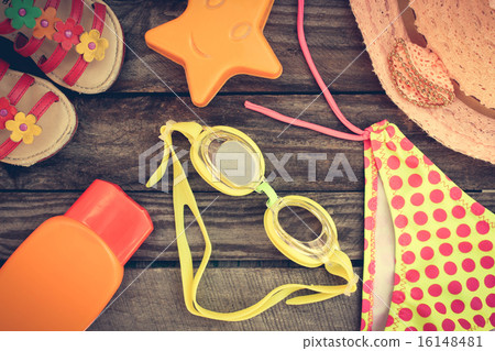 beach accessories on the old wooden background  16148481