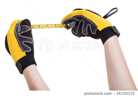 hands in protective gloves with tape measure 16150155