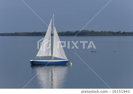 Dubrava lake with sail boat in Prelog, Croatia. Dubrava lake with sail boat in Prelog, Croatia. 16151943