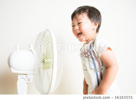 Fan and a smiling boy 16163555
