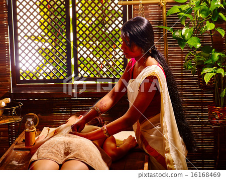 Woman having Ayurvedic spa treatment. 16168469