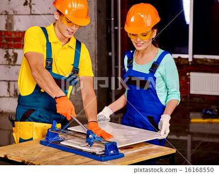 Group people builder cutting ceramic tile. 16168550