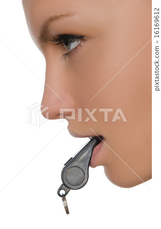 young woman holding whistle in his mouth 16169612