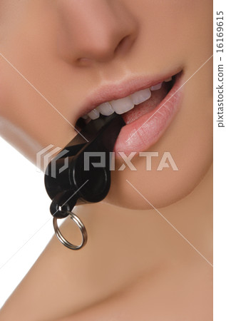 closeup of female mouth and whistle closeup of female mouth and whistle 16169615
