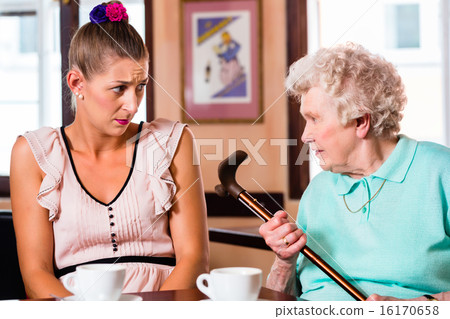 Granny and granddaughter at argument in cafe Granny and granddaughter at argument in cafe 16170658