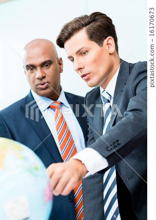 business men discussing offshoring project business men discussing offshoring project 16170673