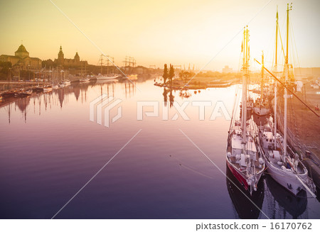 Beautiful sunrise over harbor. 16170762