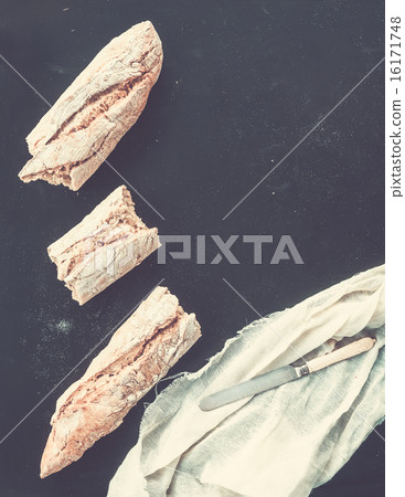 French baguette broken into pieces 16171748