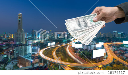 Businessman Hand with usd dollar money on Elevated highway Businessman Hand with usd dollar money on Elevated highway 16174517