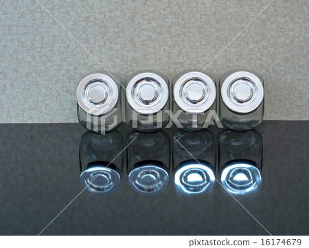 spices Glass Bottles on the shelf spices Glass Bottles on the shelf 16174679