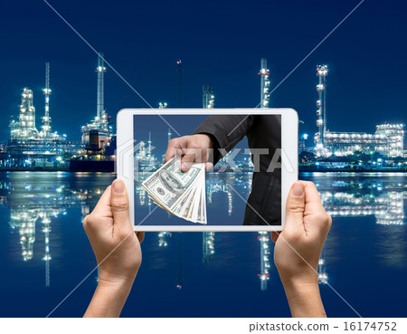 Female hands holding tablet taking pictures Petrochemical factor Female hands holding tablet taking pictures Petrochemical factor 16174752