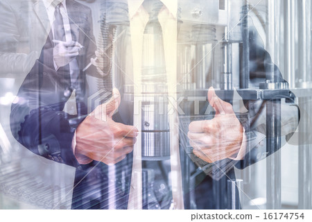 Double exposure of businessman with Industrial equipment Double exposure of businessman with Industrial equipment 16174754