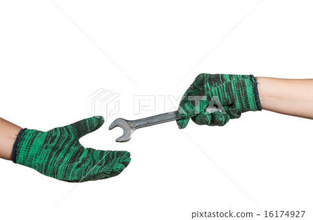 hand holding and sending the wrench on white background. industr hand holding and sending the wrench on white background. industr 16174927