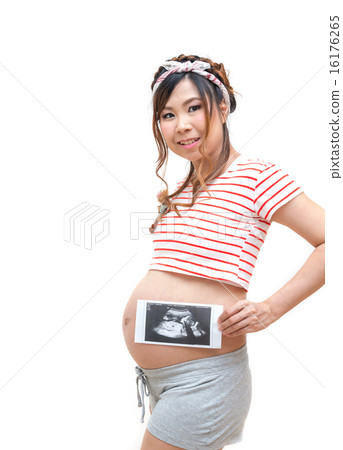 Pregnant woman with ultrasound paper Pregnant woman with ultrasound paper 16176265