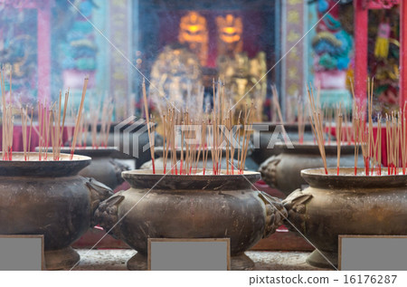 Burning incense in pot soft focus at Chinese temple 16176287