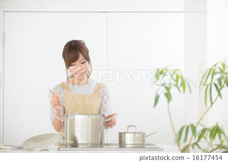 Young woman cooking 16177454