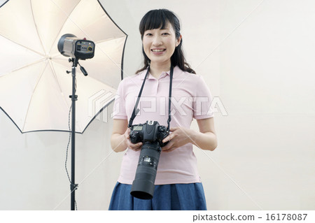 Studio, smiling female photographer Studio, smiling female photographer 16178087