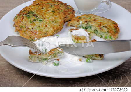 Fritters of zucchini and peas Fritters of zucchini and peas 16178412