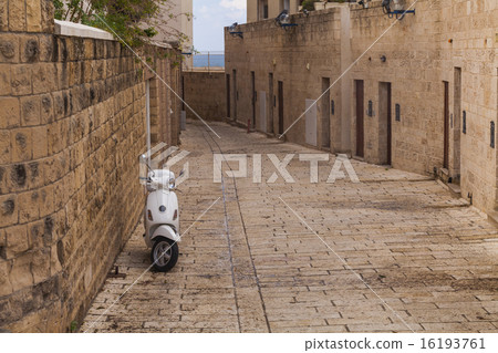 Scooter on the old narrow street of Jaffa. 16193761