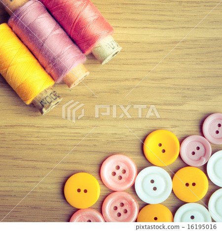 Spools of threads and buttons Spools of threads and buttons 16195016