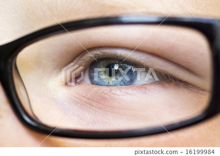 Eye in glasses close up 16199984