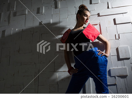 Fashion portrait of a girl in the designer pantsuit 16200601
