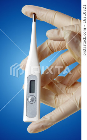 hand with gloves and thermometer hand with gloves and thermometer 16210821