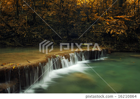 Waterfall in the forest nature background 16210864