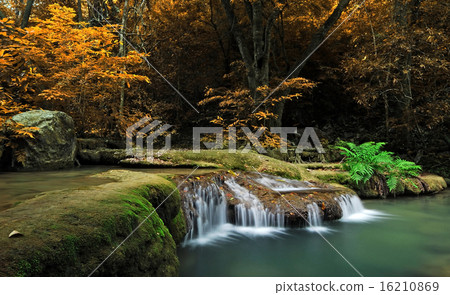 Waterfall in the forest nature background 16210869