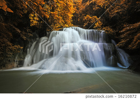 Waterfall in the forest nature background 16210872