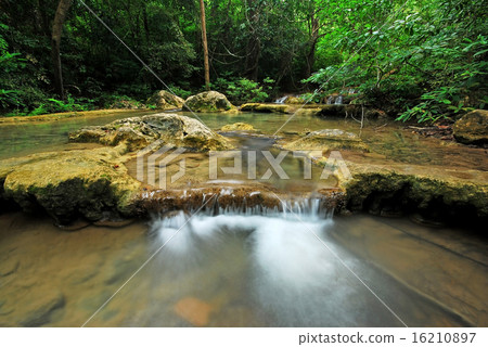 Waterfall in the forest nature background 16210897