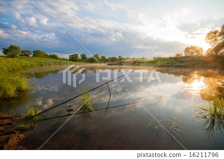 Fishing tackle in a pond 16211796