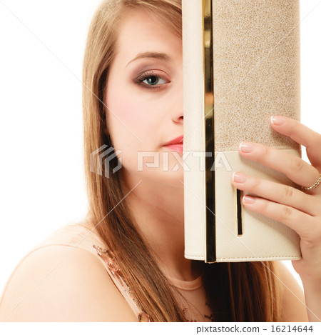 Elegance. Girl covering face with elegant handbag Elegance. Girl covering face with elegant handbag 16214644