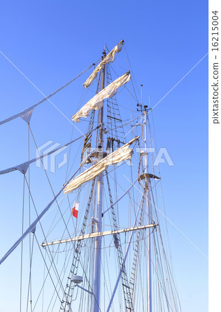 Sailing ship mast against a clear blue sky. Sailing ship mast against a clear blue sky. 16215004