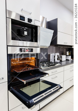 Modern custom hi-tek kitchen, oven with open door 16223184