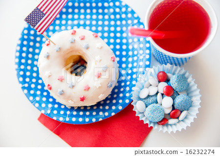 donut with juice and candies on independence day 16232274