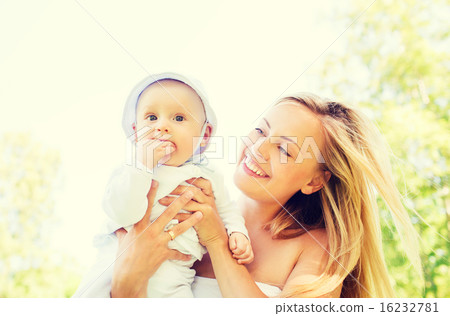 happy mother with little baby outdoors happy mother with little baby outdoors 16232781