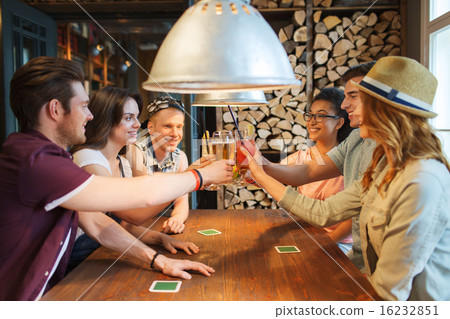 happy friends drinking beer at bar or pub 16232851