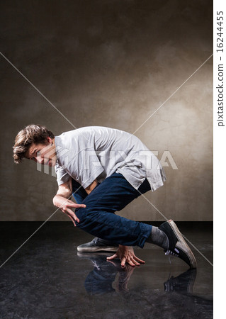 urban hip hop dancer over grunge concrete wall 16244455