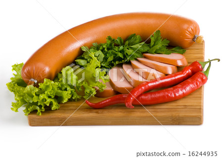 Sausages on a wooden plate 16244935