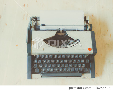 Old Typewriter on wooden table. Old Typewriter on wooden table. 16254322