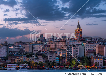 Galata Tower lit up in early evening along the Gol Galata Tower lit up in early evening along the Gol 16255288