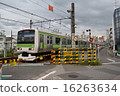 The train going only at the Yamanote Line railroad crossing 16263634