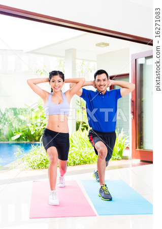 fitness couple at sport workout in tropical home 16271083