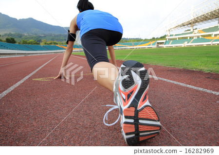 young woman runner getting ready for a run young woman runner getting ready for a run 16282969