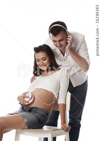New mom and dad Listening to baby heartbeat New mom and dad Listening to baby heartbeat 16290365