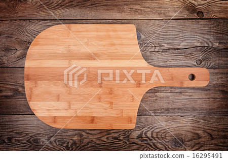 pizza board on old table 16295491