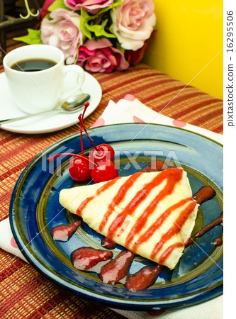 Crape cake with strawberry jam and cherry  16295506