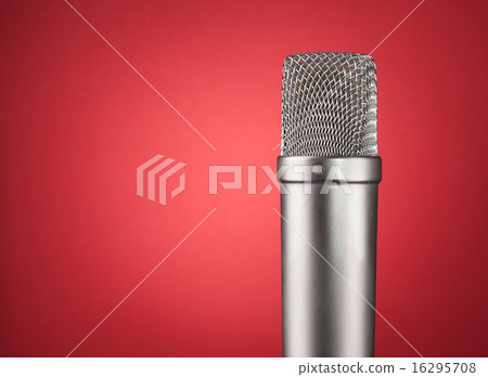 Studio microphone on a red background Studio microphone on a red background 16295708