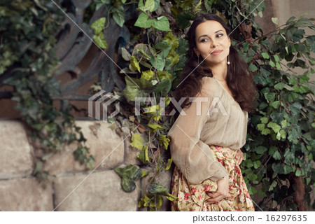 Young beautiful woman in flower skirt Young beautiful woman in flower skirt 16297635